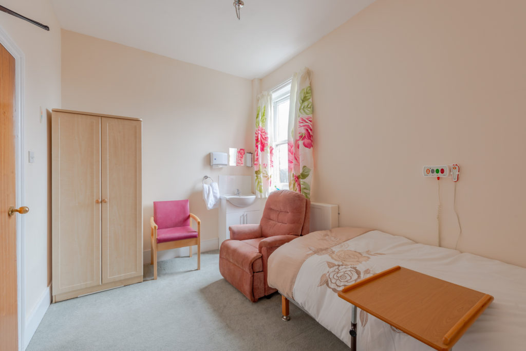 a bedroom in our care home near Ditchling